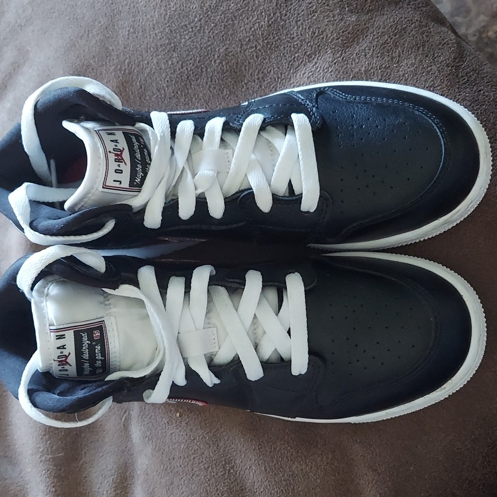 Nike Jordan high top boy shoes.